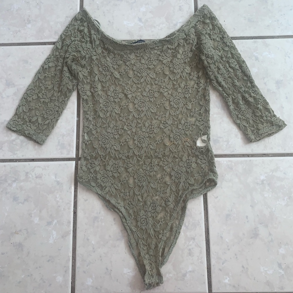 Olive green lace bodysuit. It has a small stain (in the photo you can see it).